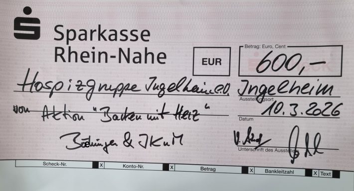 Scheck über 600 Euro von der Sparkasse Rhein-Nahe mit handschriftlichen Notizen.